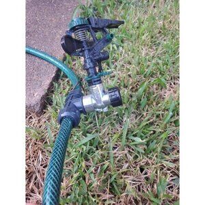 Plastic Pulsating Sprinkler on Metal Spike with Quick Connect Product Adapter
